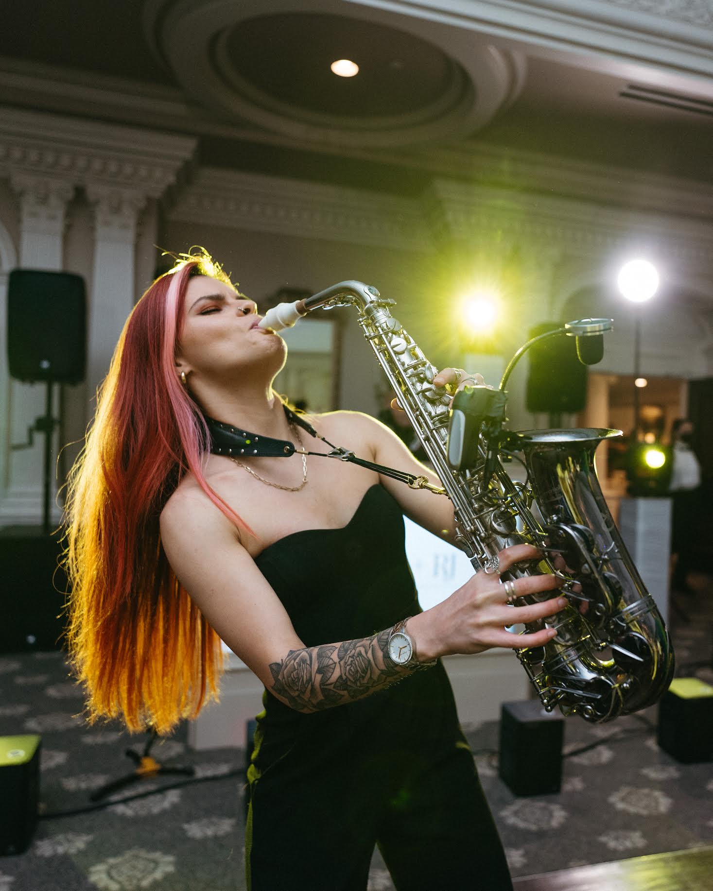 Saxophonist playing and wedding DJ
