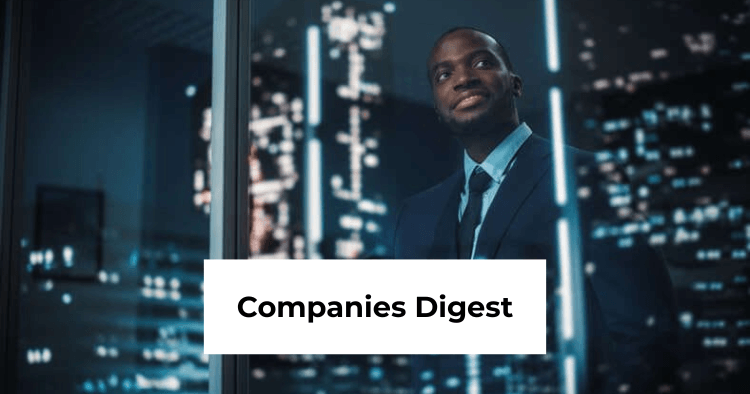 A man in a suit stands by a window overlooking a city at night, with the words "Companies Digest" displayed in a white box.